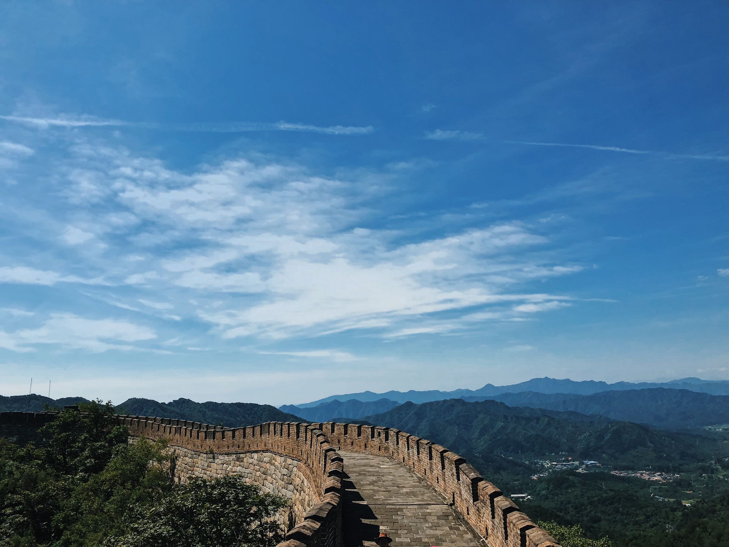 The Great Wall stretching across green hills