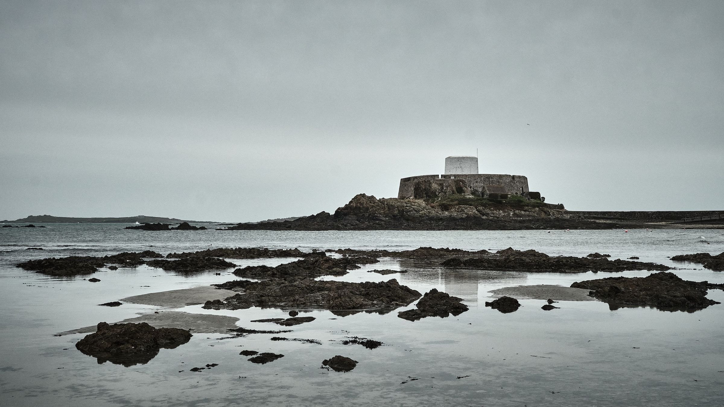 A castle on Guernsey's rocky shore