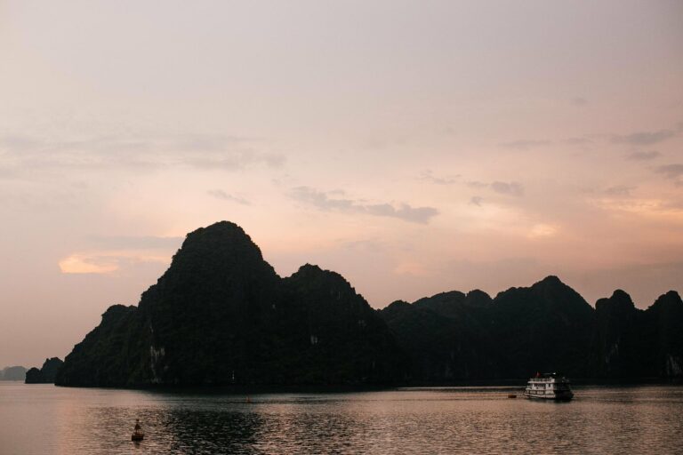 A boat on Ha Long Bay at sunset
