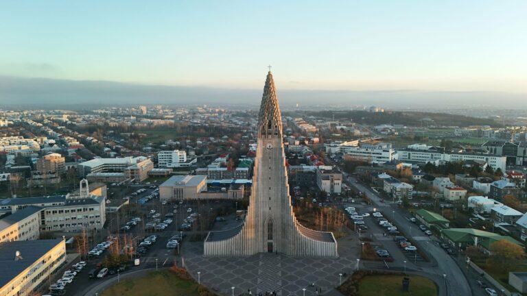Hallgrímskirkja rising above Reykjavík at sunrise