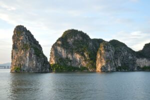 Limestone karsts reflected in Halong Bay