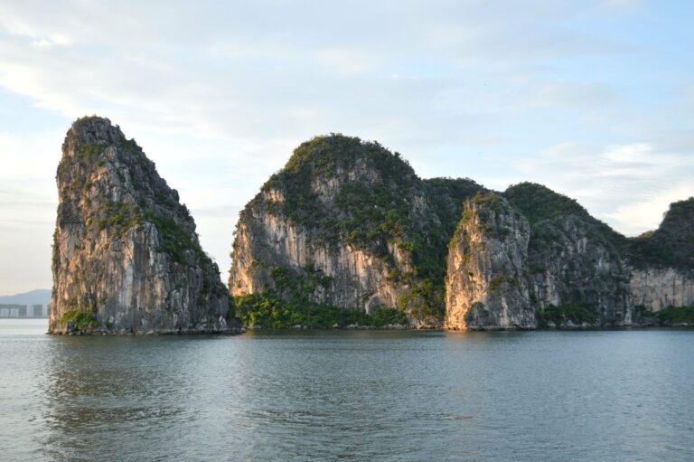 Limestone karsts reflected in Halong Bay
