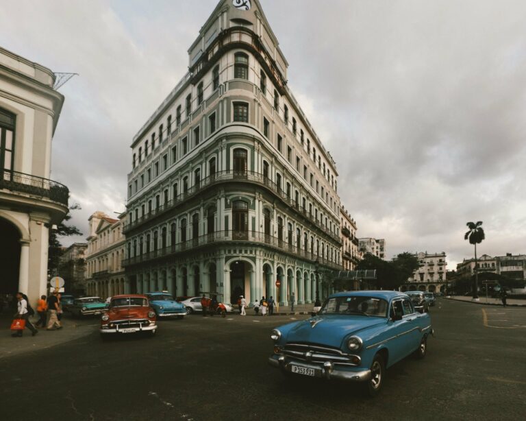 Classic cars at a historic intersection in Havana