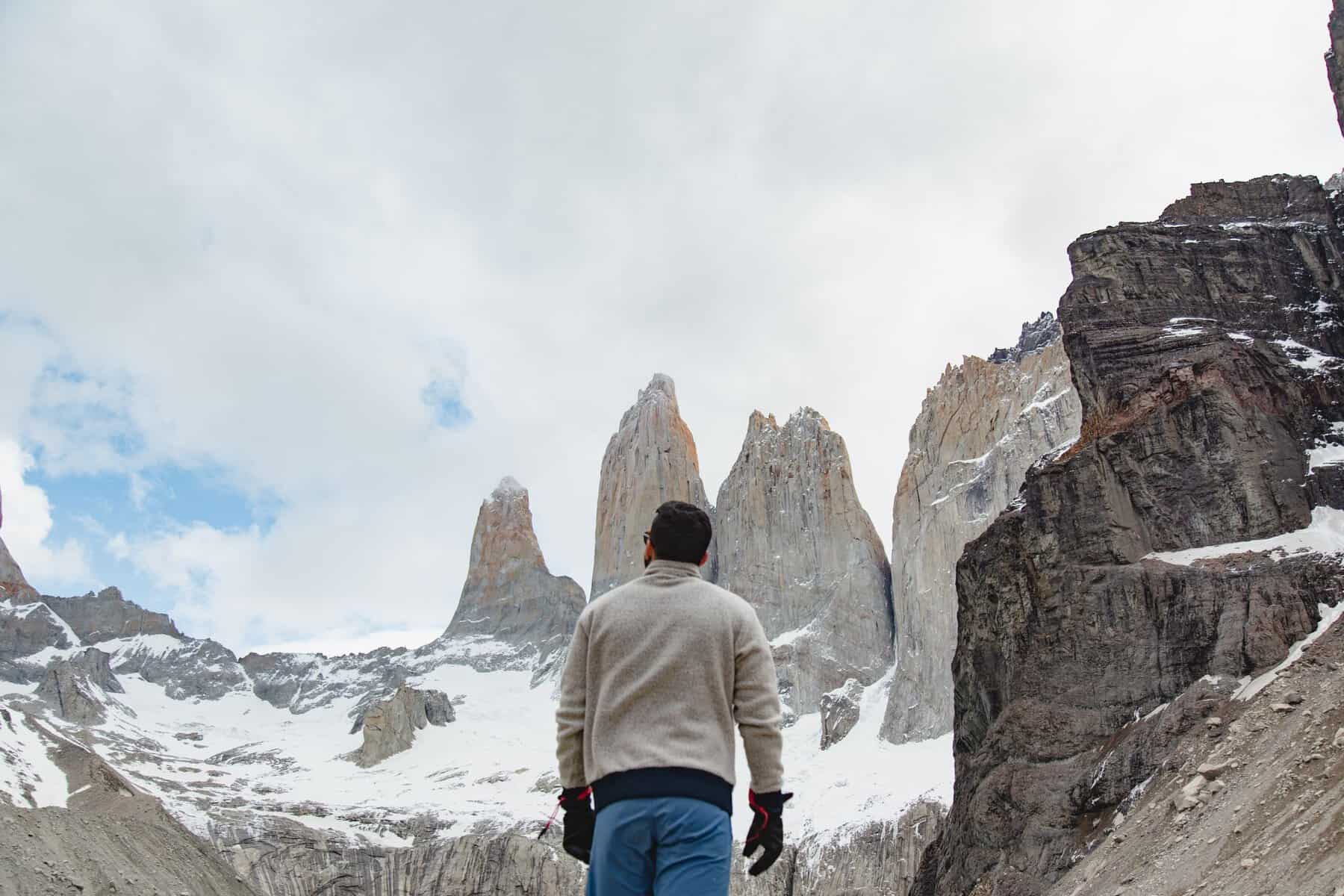 A hiker beneath the towers in Torres del Paine