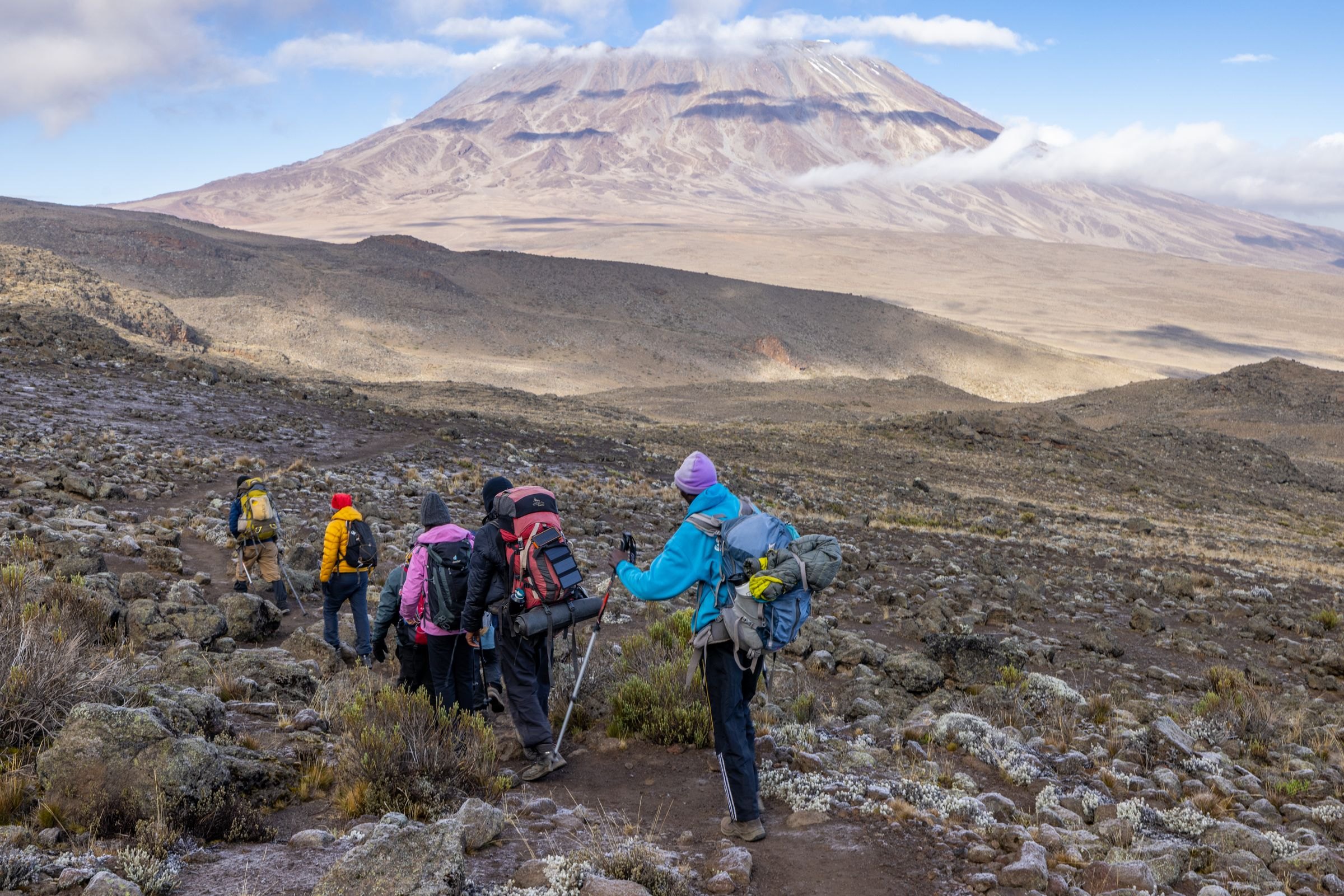 Hikers on the rocky trails of Kilimanjaro