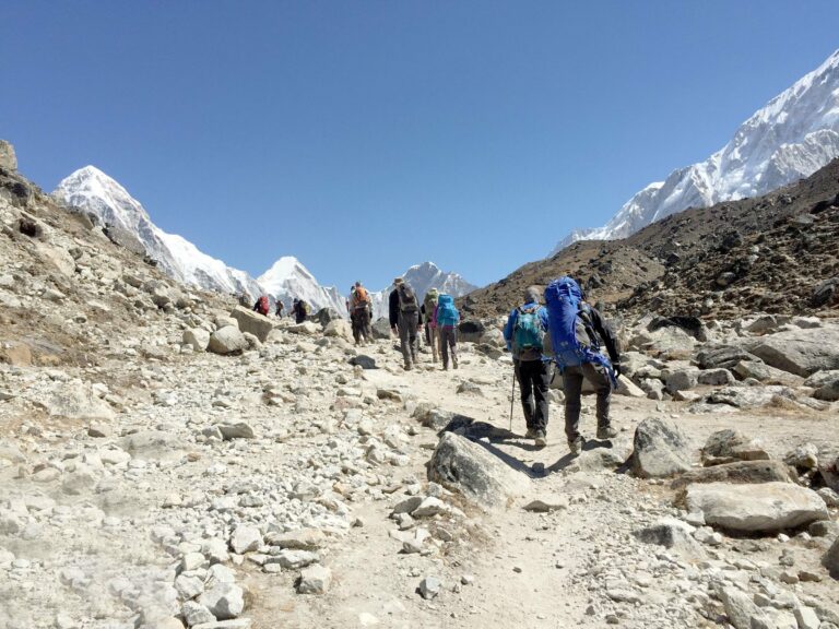 Trekkers on a rocky Himalayan trail
