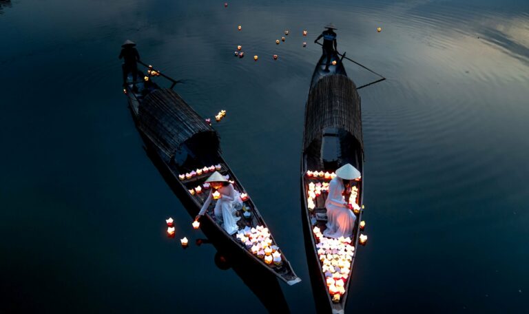 Lantern-lit boats on the river in Hoi An