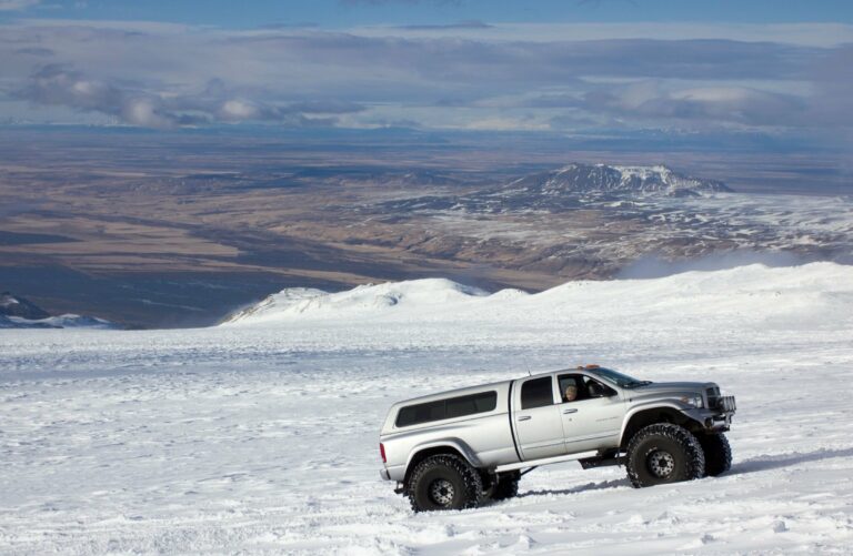 A super jeep crossing deep snow in Iceland