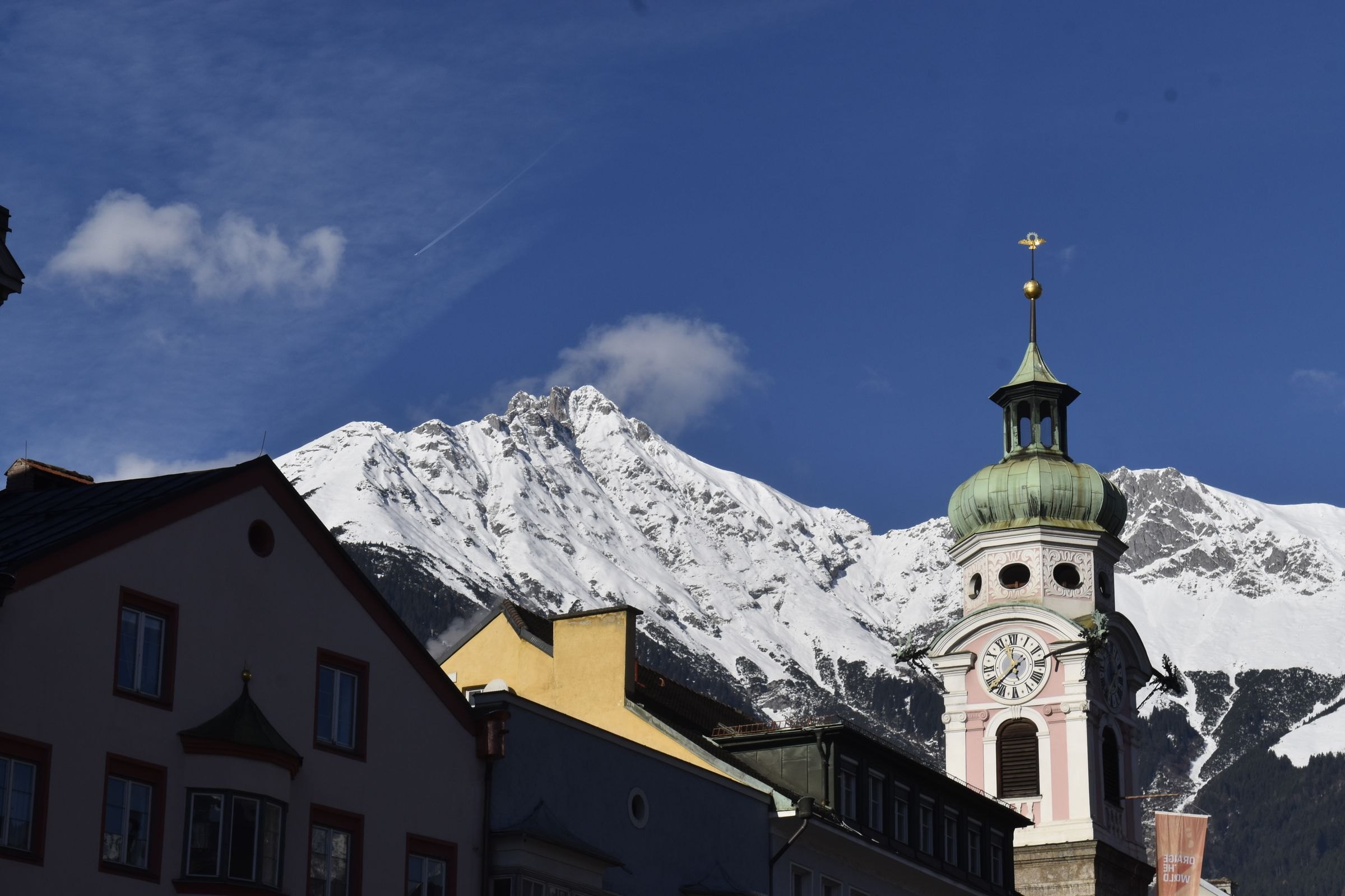 Innsbruck's old town below the snowy Alps