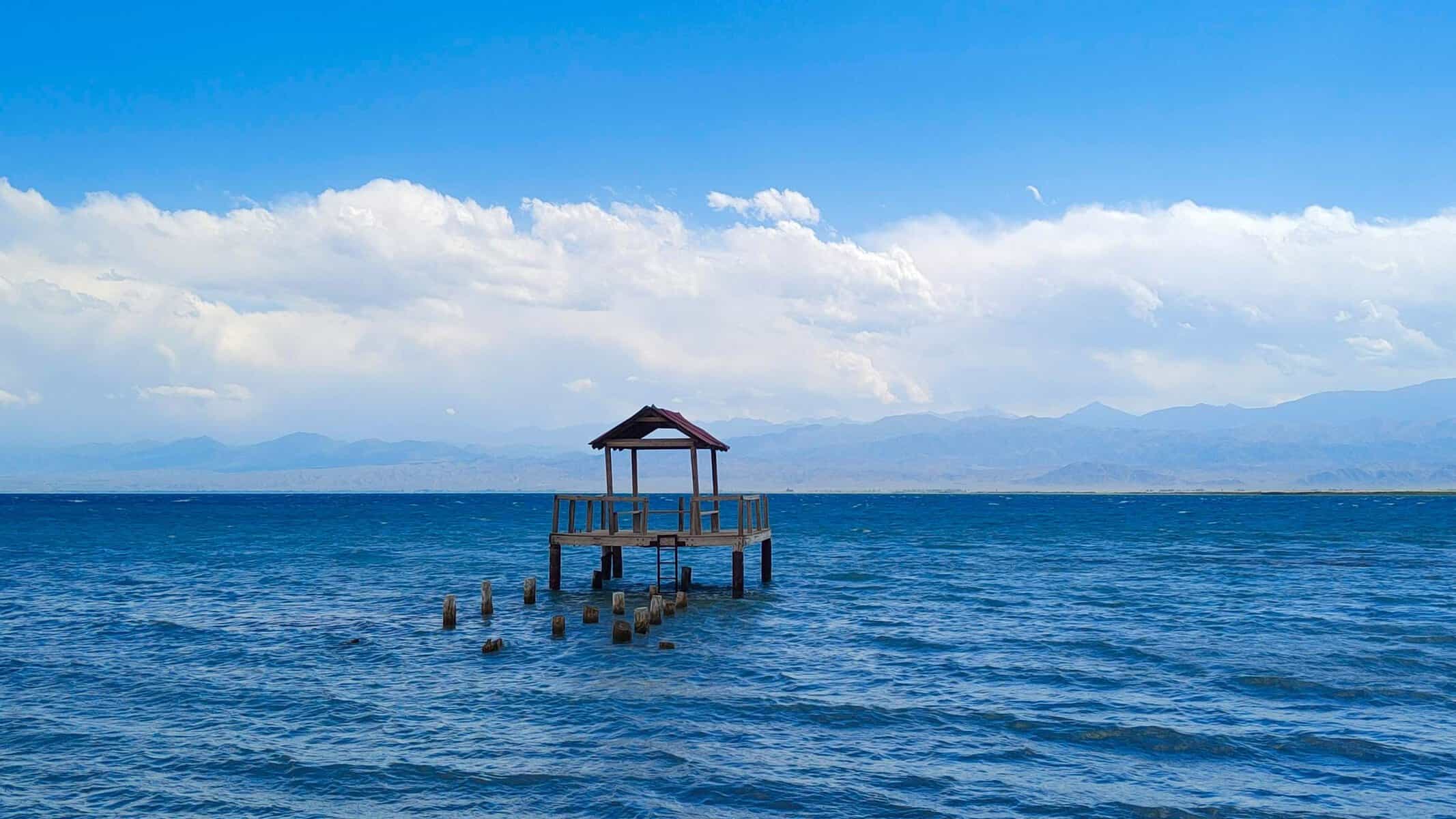 A gazebo over the clear water of Issyk-Kul, Kyrgyzstan