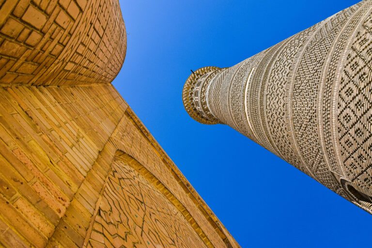 The Kalyan Minaret in Bukhara against a blue sky