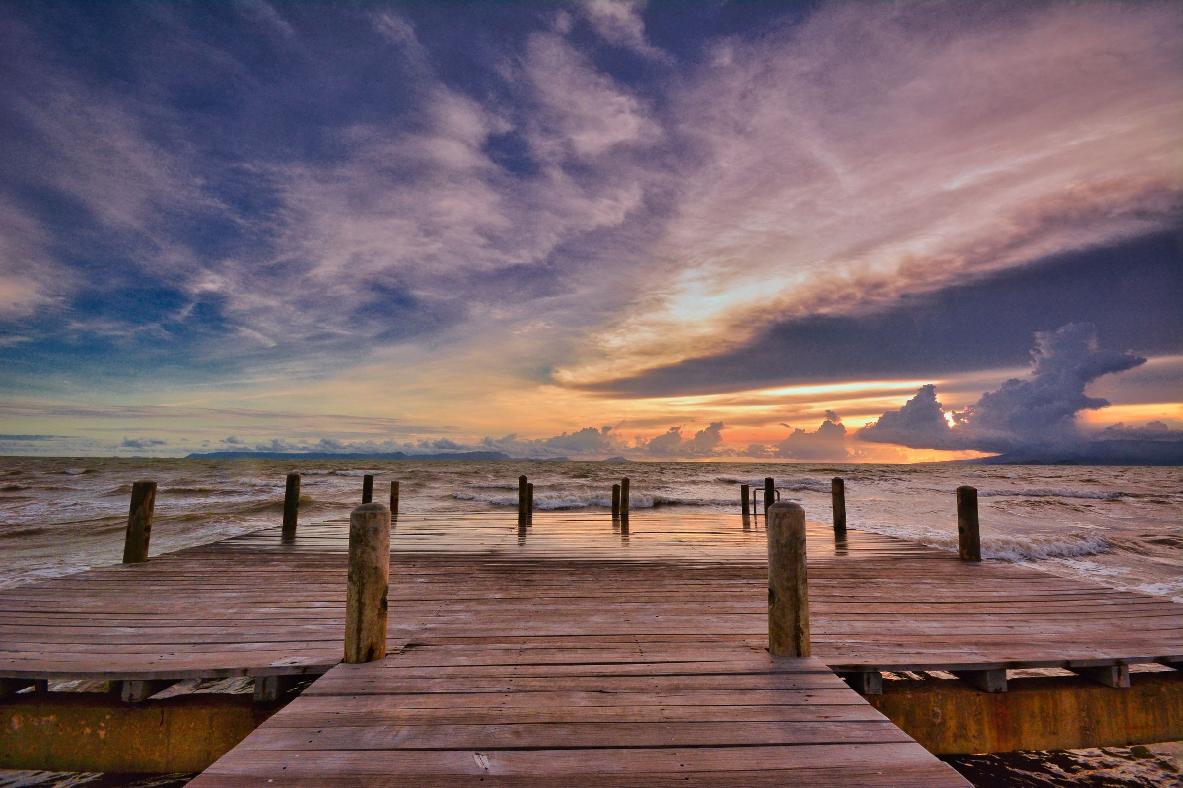 Sunset over a jetty in Kampot province