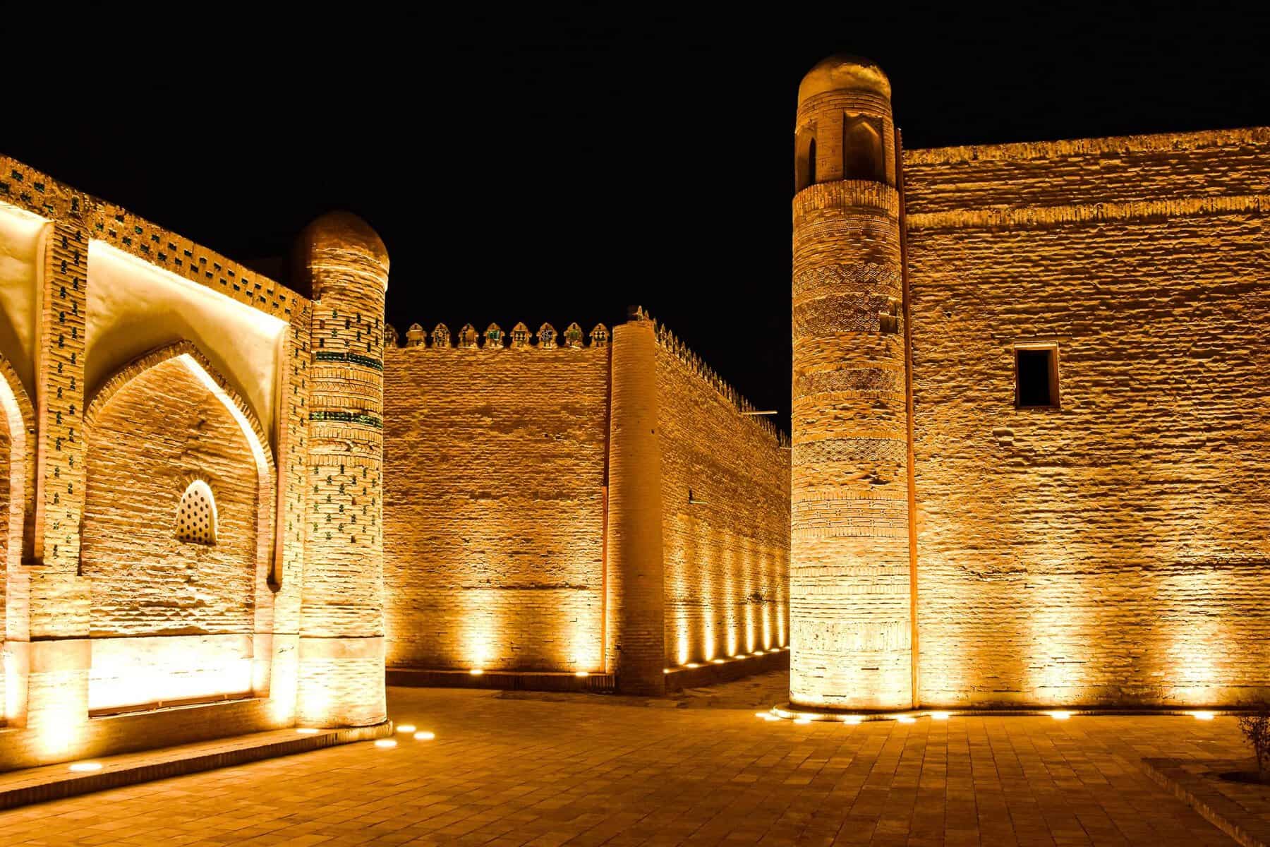 The walls of Khiva lit up at night