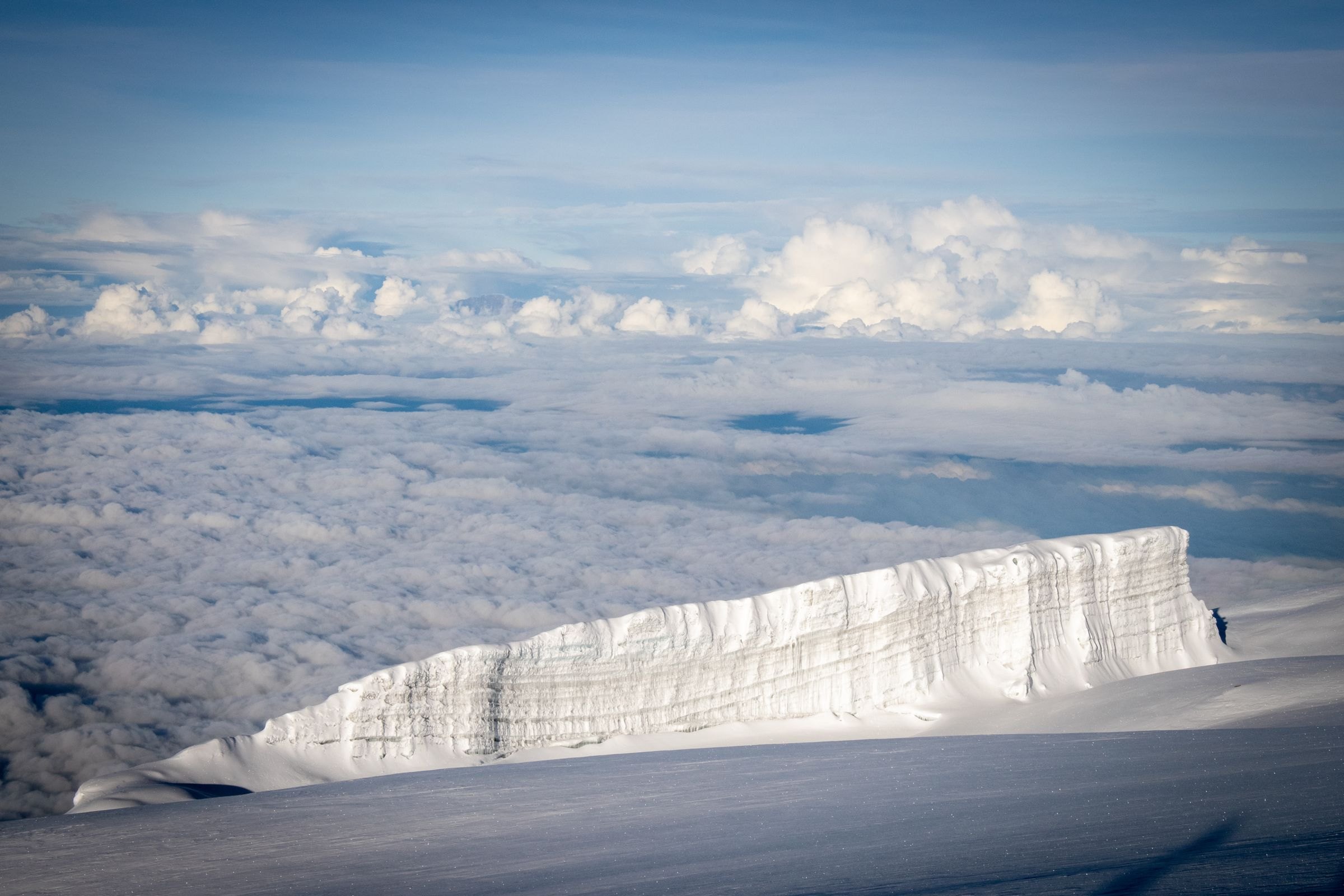 An ice formation on the summit of Kilimanjaro above the clouds