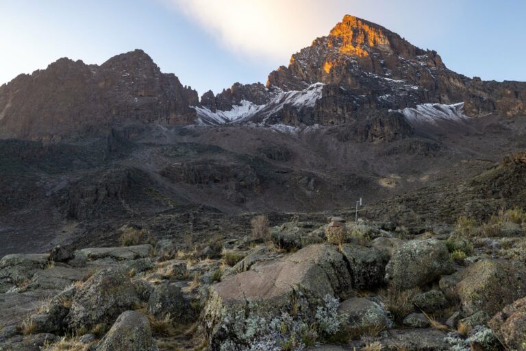Kilimanjaro's rocky upper slopes lit at sunrise