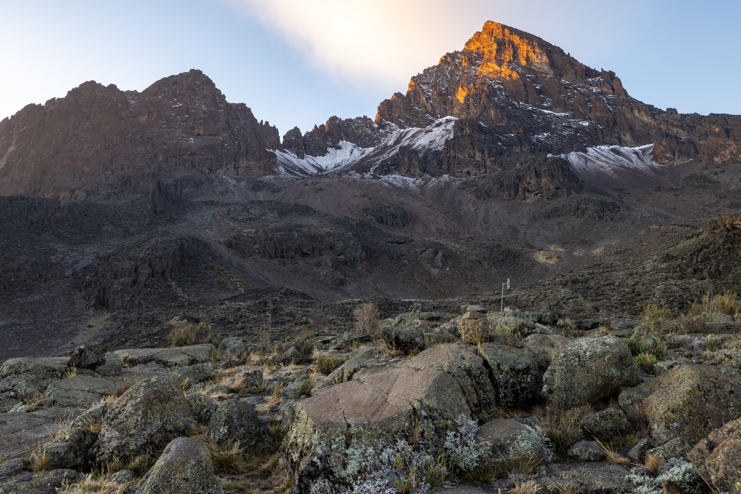 Kilimanjaro's rocky upper slopes lit at sunrise