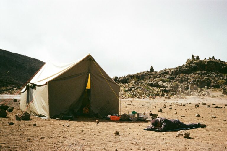 A tent pitched on the rocky slopes of Kilimanjaro