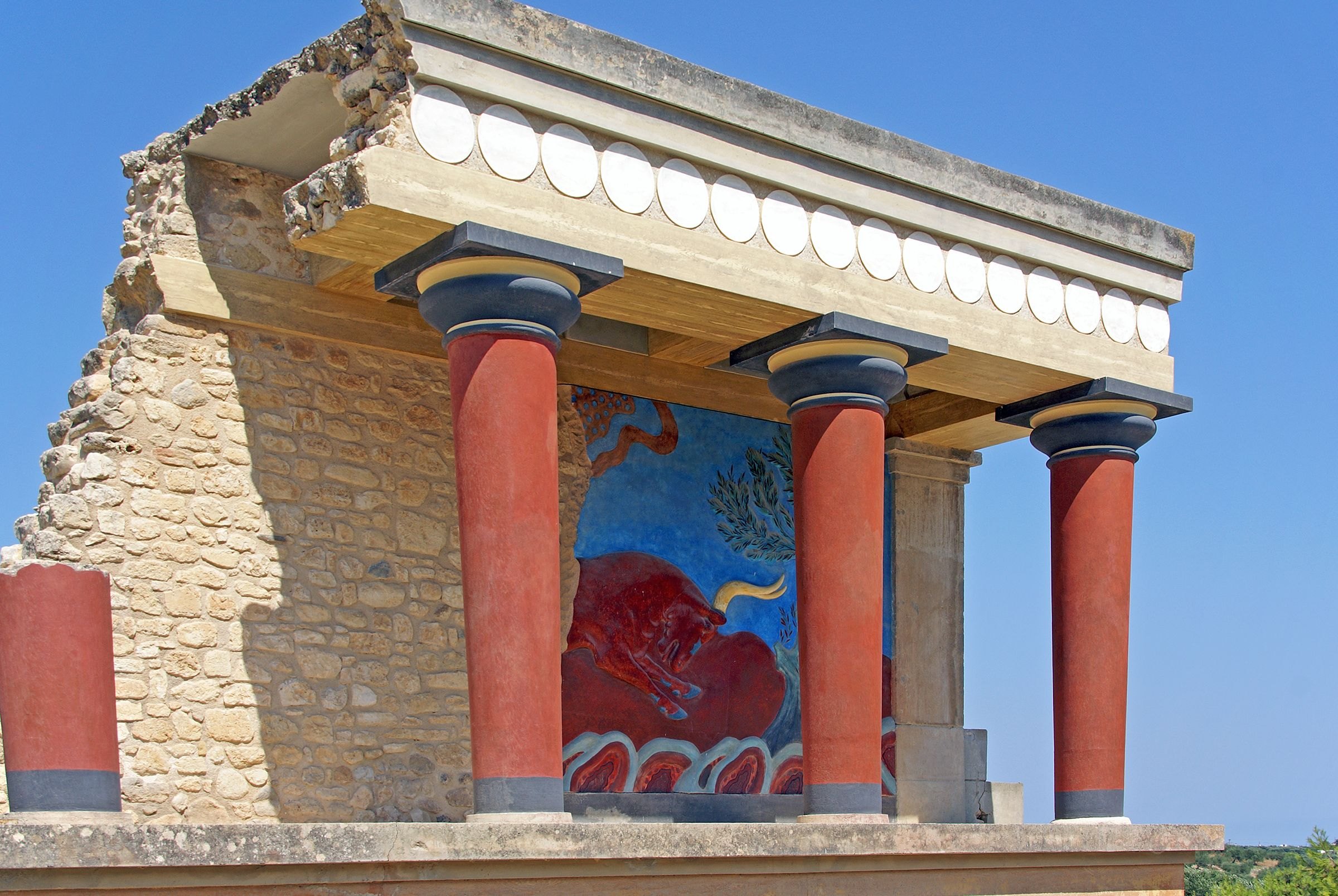 The red columns and frescoes of the Palace of Knossos