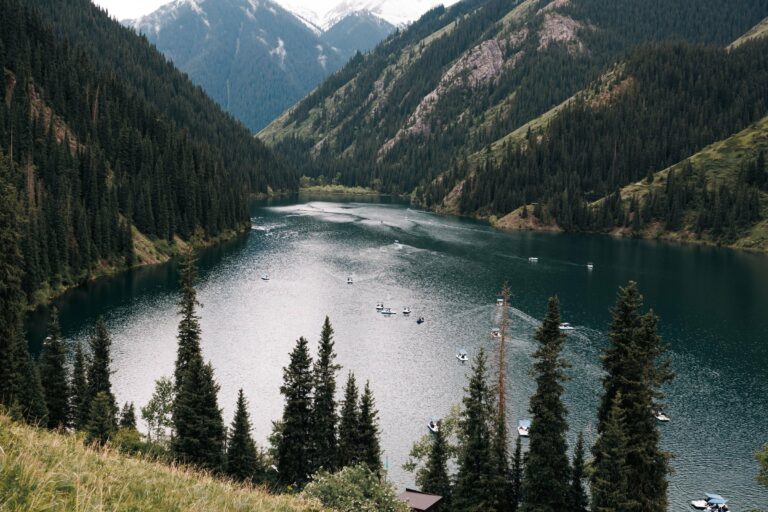 Kolsay Lake among pine-covered mountains