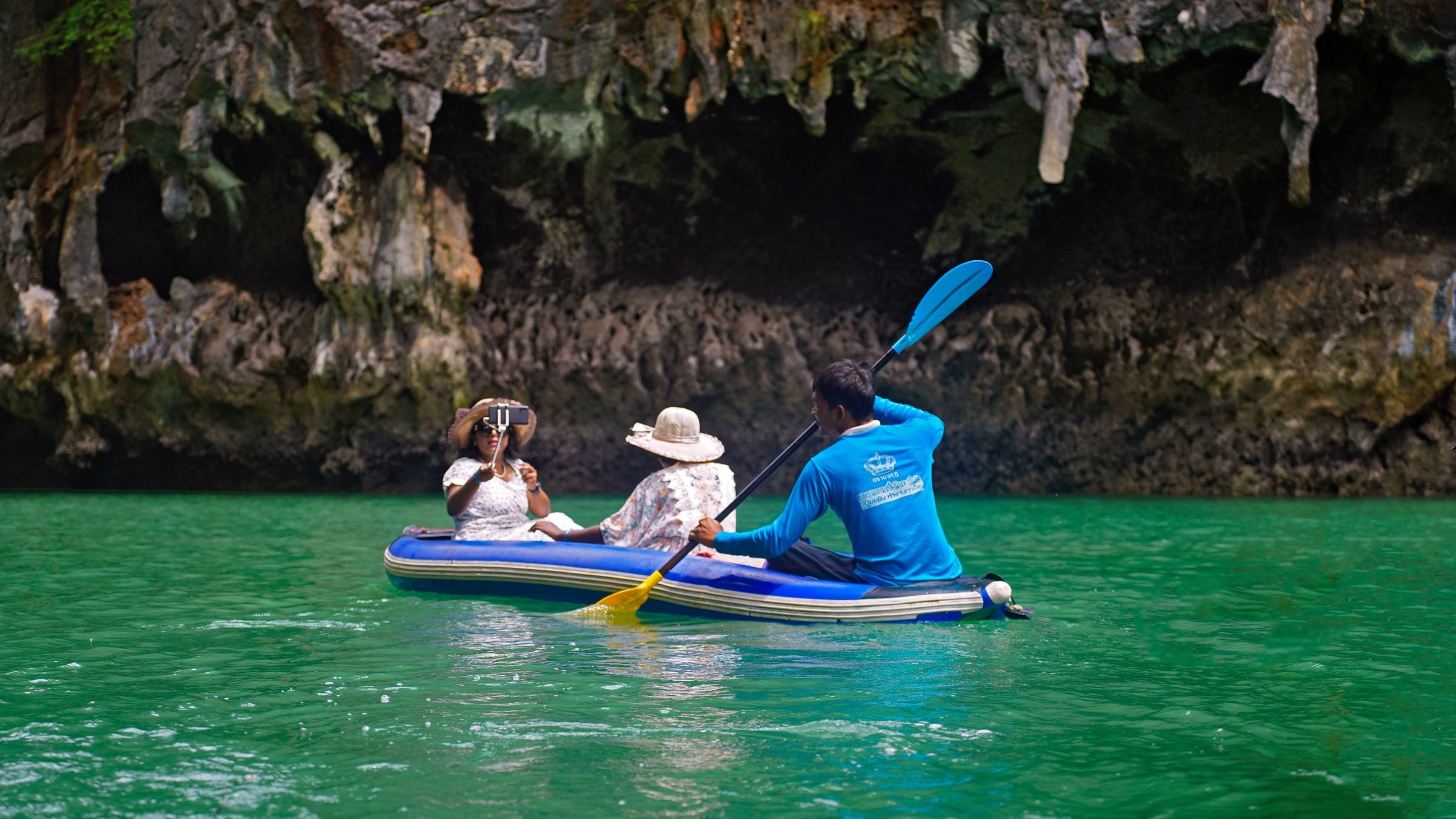 Sea kayaking through limestone caves near Krabi