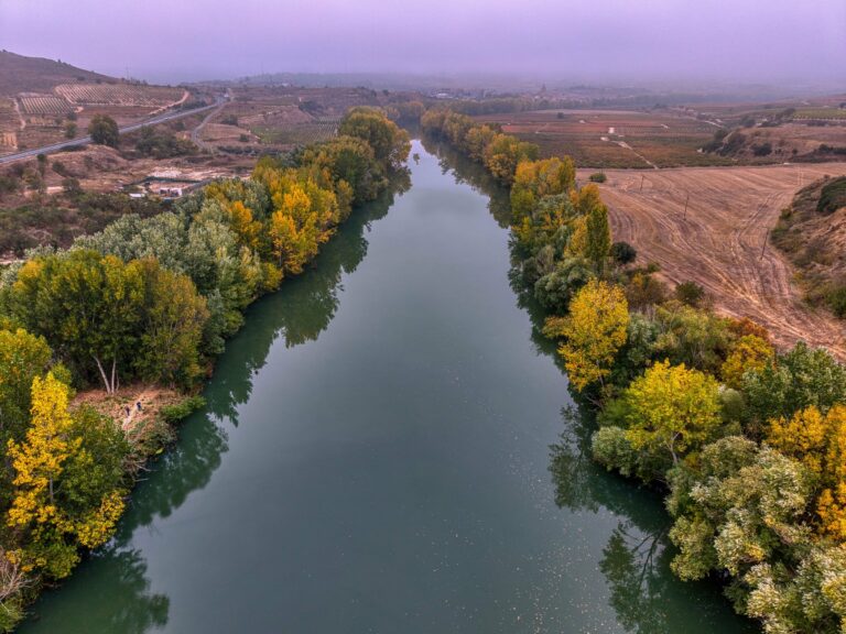 A river through autumn colours in La Rioja