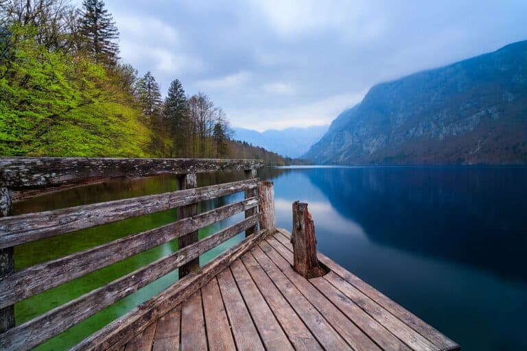 A wooden pier on Lake Bohinj in the Julian Alps, Slovenia