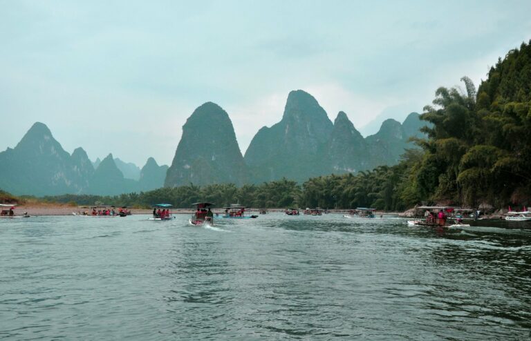 Boats on the Li River among karst peaks