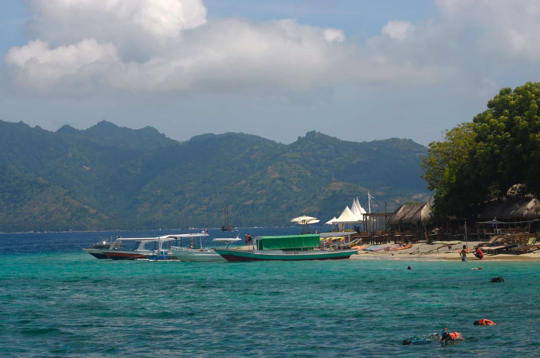 Boats off a beach in West Nusa Tenggara, Indonesia