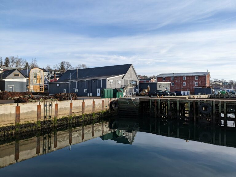 Historic buildings reflected in Lunenburg harbour