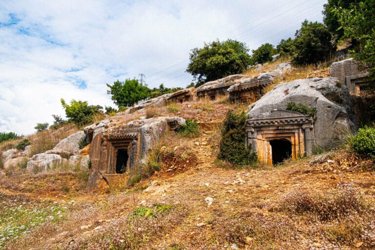 Rock-cut tombs on a hillside on the Lycian coast