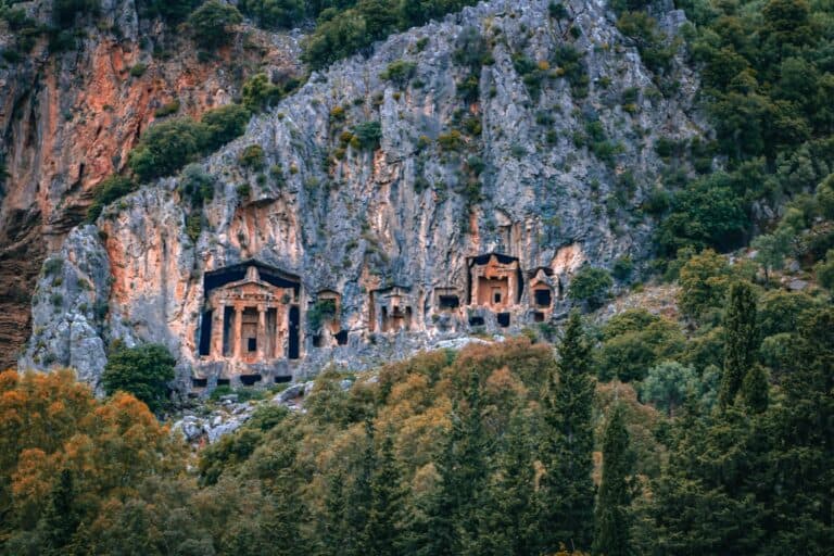 Ancient Lycian rock tombs carved into a cliff, Turkey