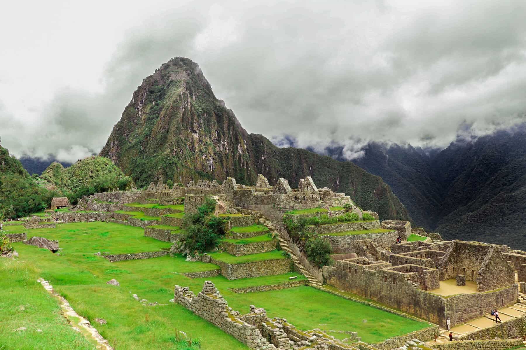 Machu Picchu beneath misty peaks