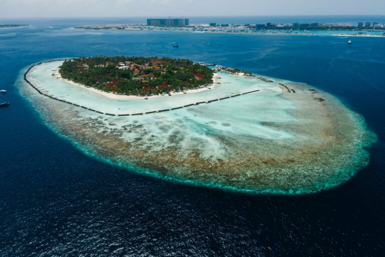 A tropical island ringed by reef in the Maldives