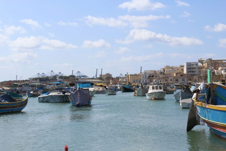 Colourful fishing boats in a Maltese harbour