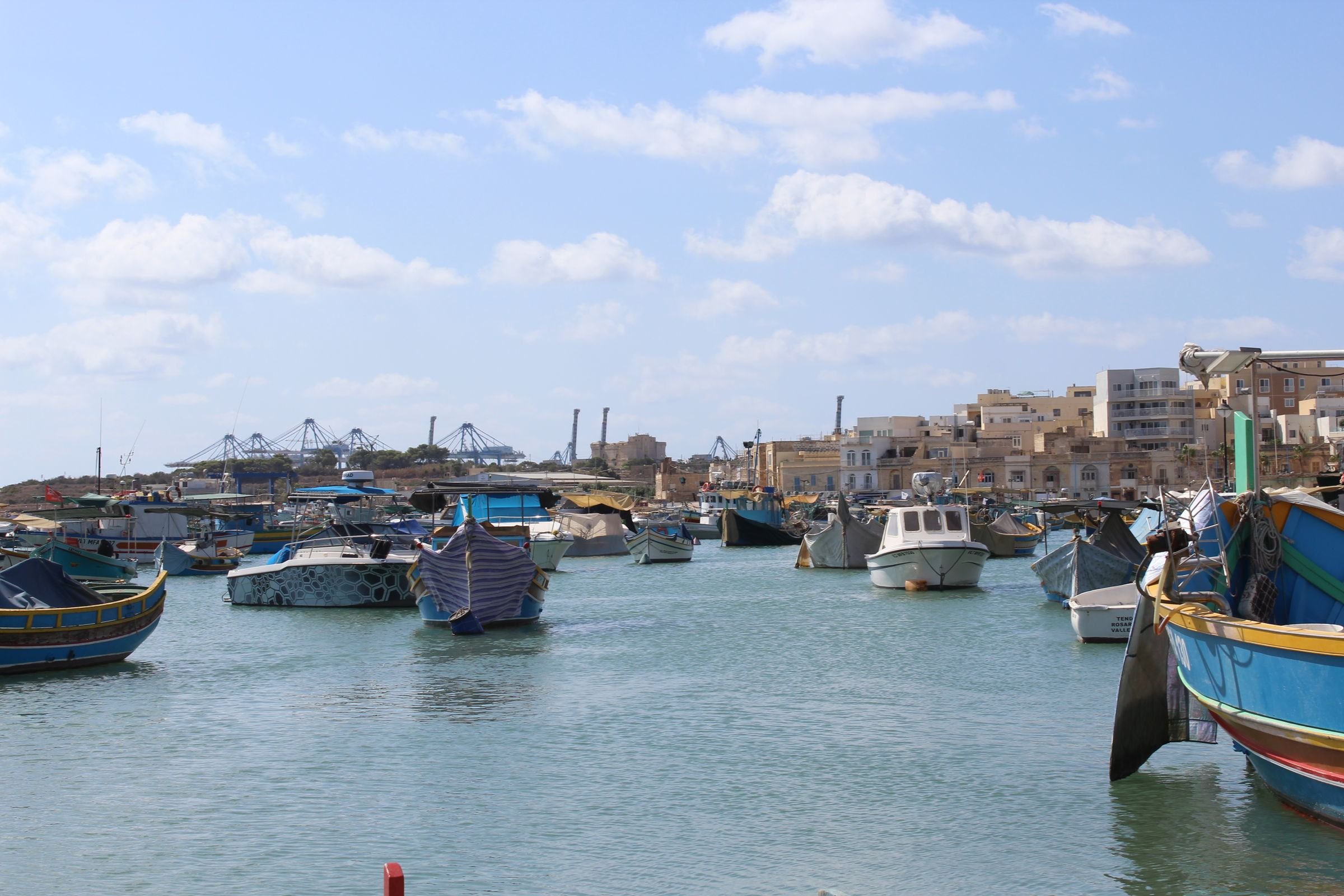 Colourful fishing boats in a Maltese harbour