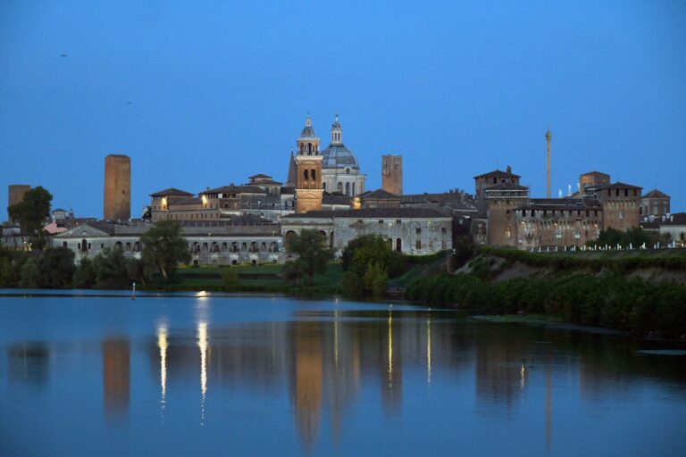 The skyline of Mantua reflected in its lake