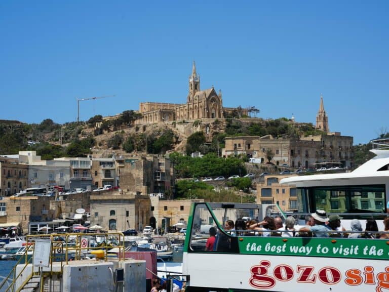 Mġarr harbour beneath its hilltop church, Gozo