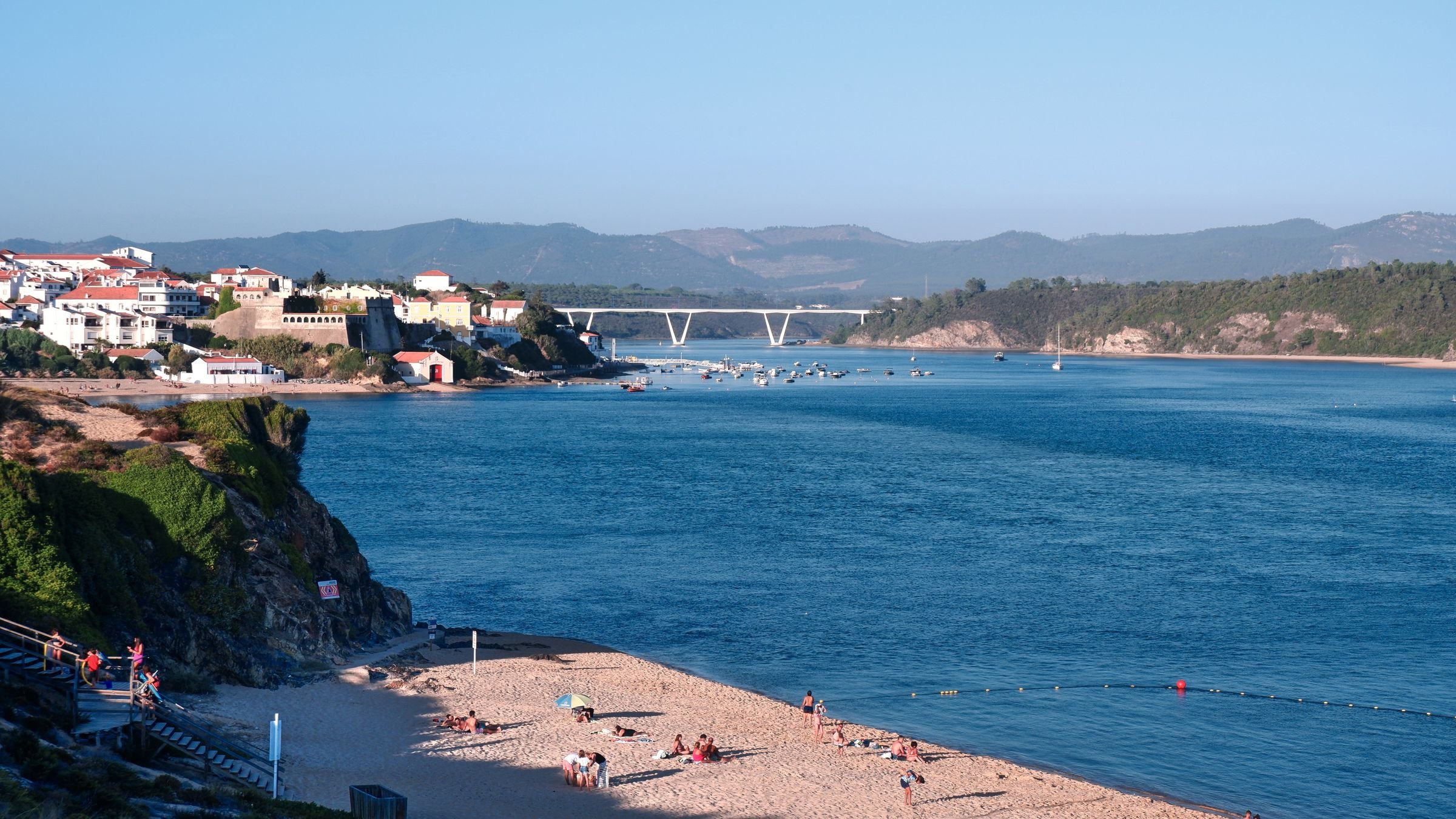 The beach and river bridge at Vila Nova de Milfontes