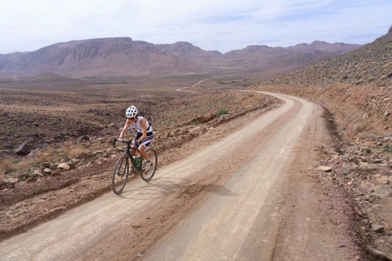 A cyclist on a desert track in Morocco