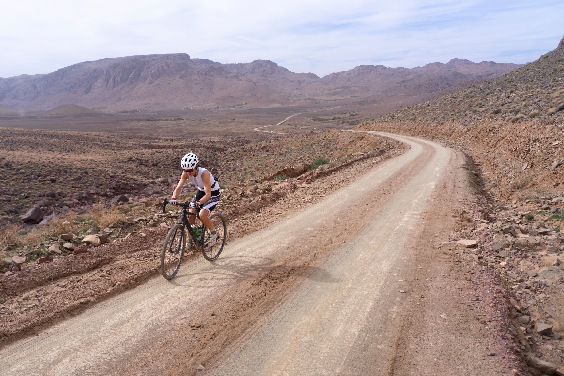 A cyclist on a desert track in Morocco