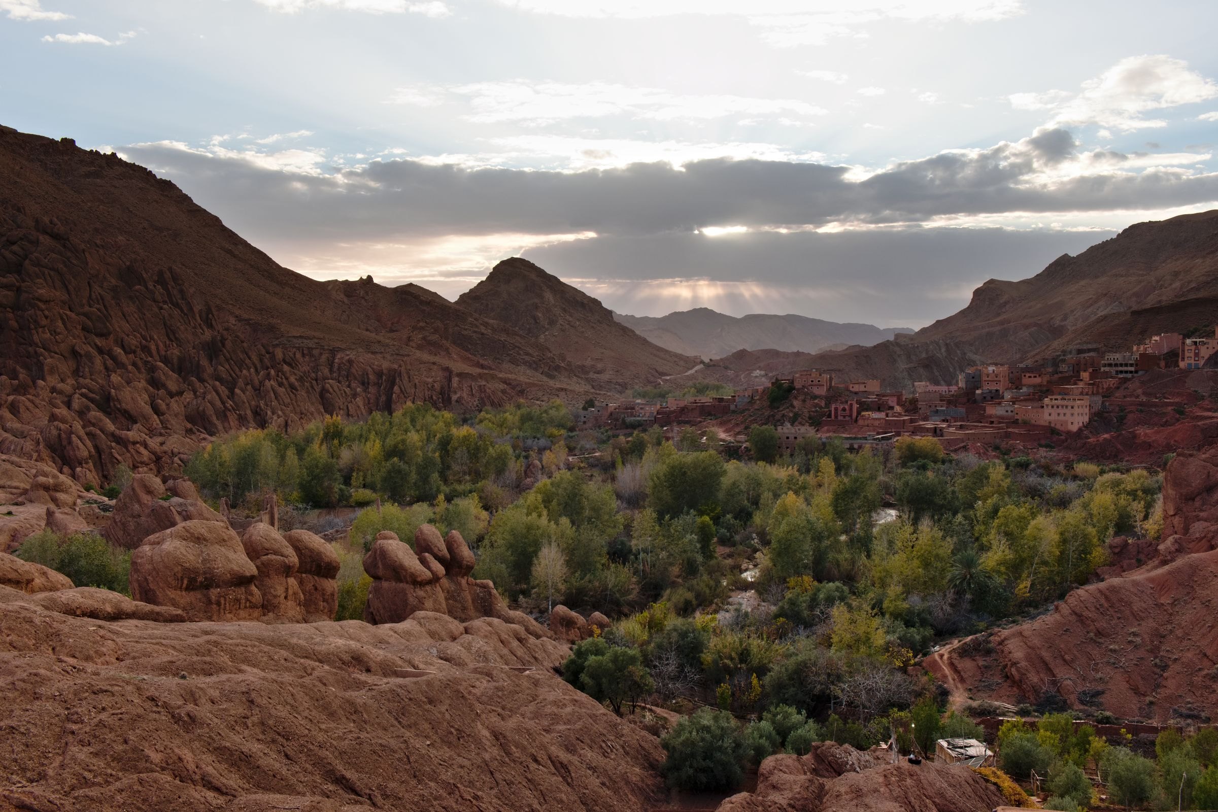 A green valley between rocky Moroccan mountains