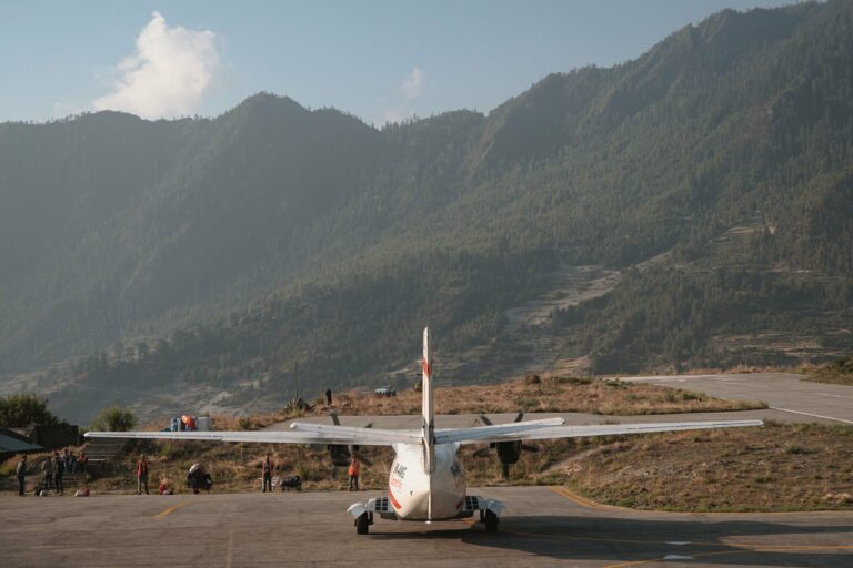 A small aircraft on a mountain airstrip in Nepal