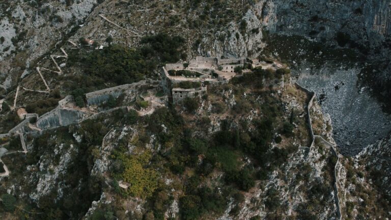 Castle ruins on a rugged mountain ridge