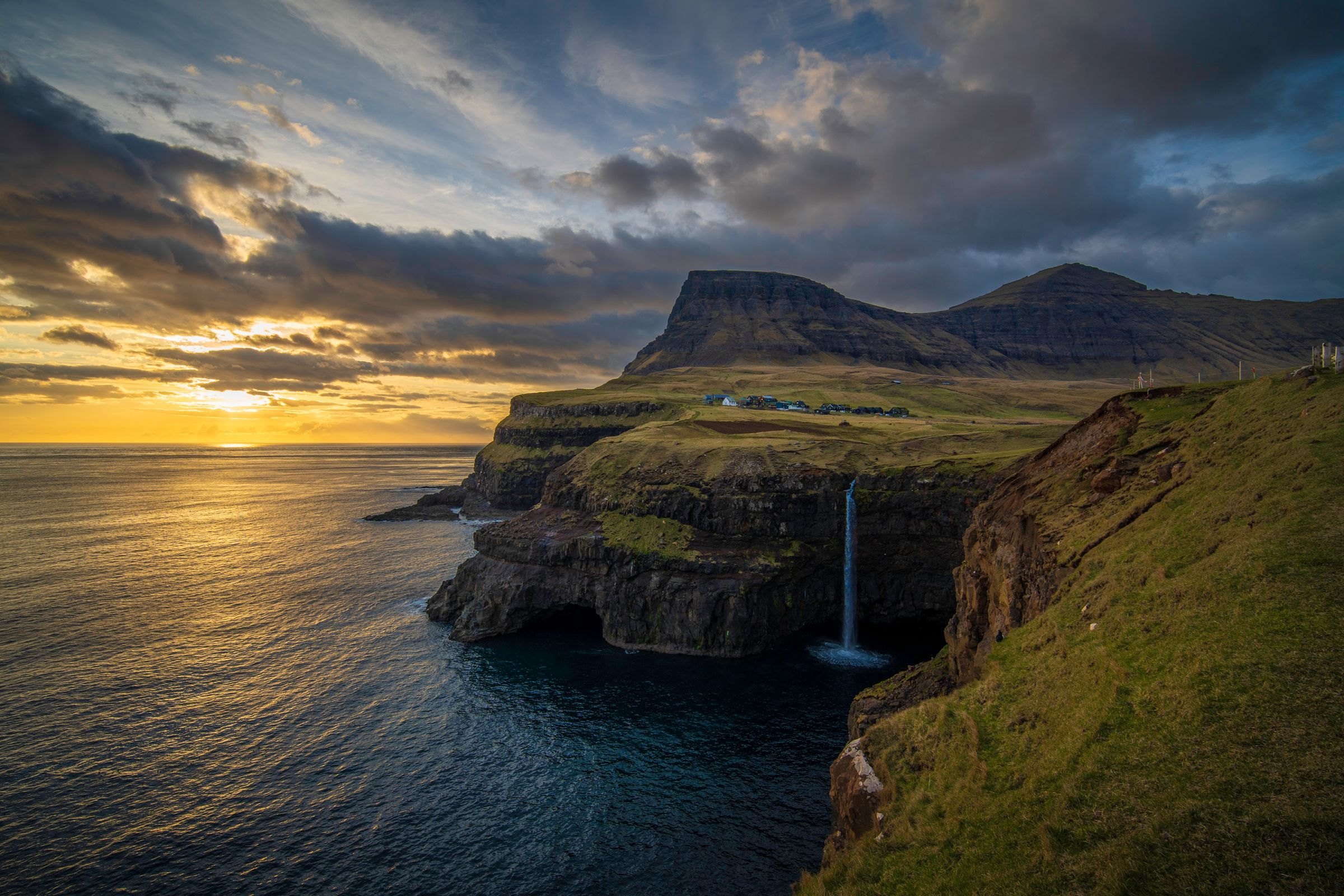 The Múlafossur waterfall at sunset