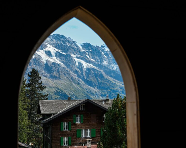 The Alps seen through an arched window in the Jungfrau region