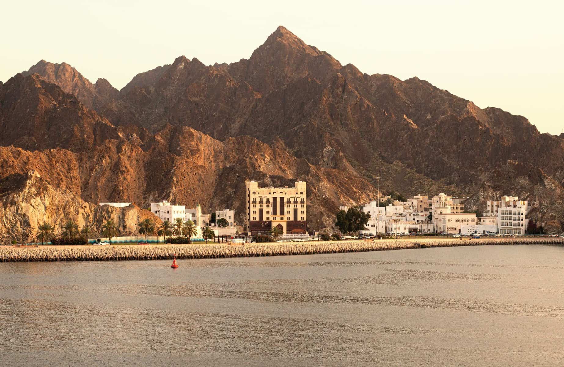 The coast of Muscat beneath rugged mountains, Oman