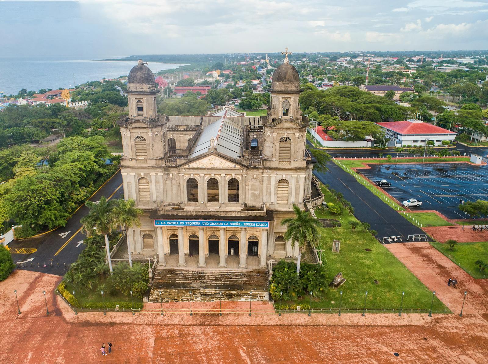 Granada colonial cathedral with volcano backdrop, Nicaragua