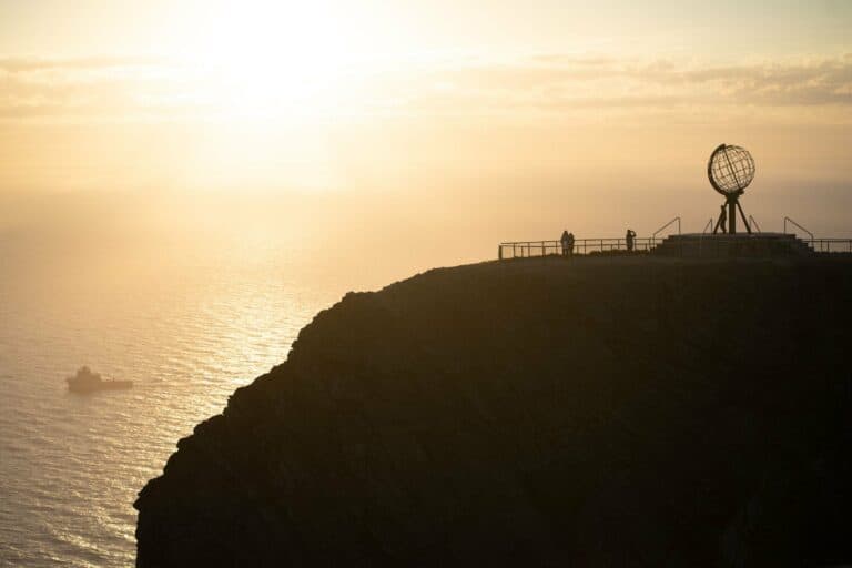 The globe monument at the North Cape at sunset
