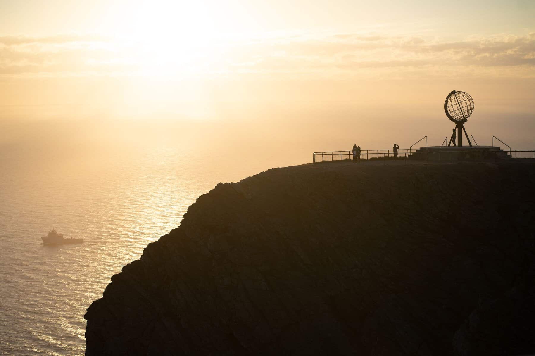 The globe monument at the North Cape at sunset