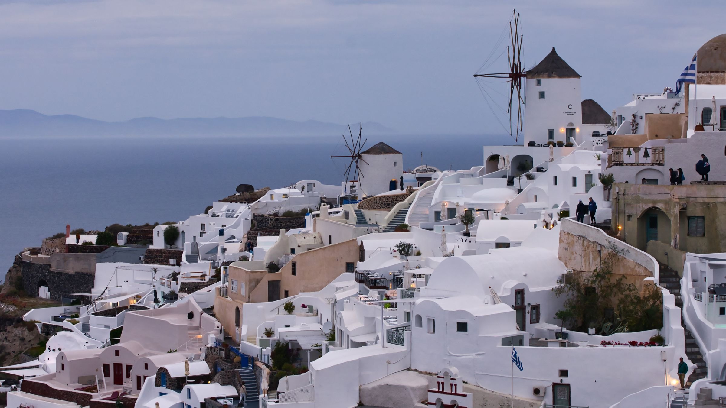 White houses and windmills in Oia, Santorini
